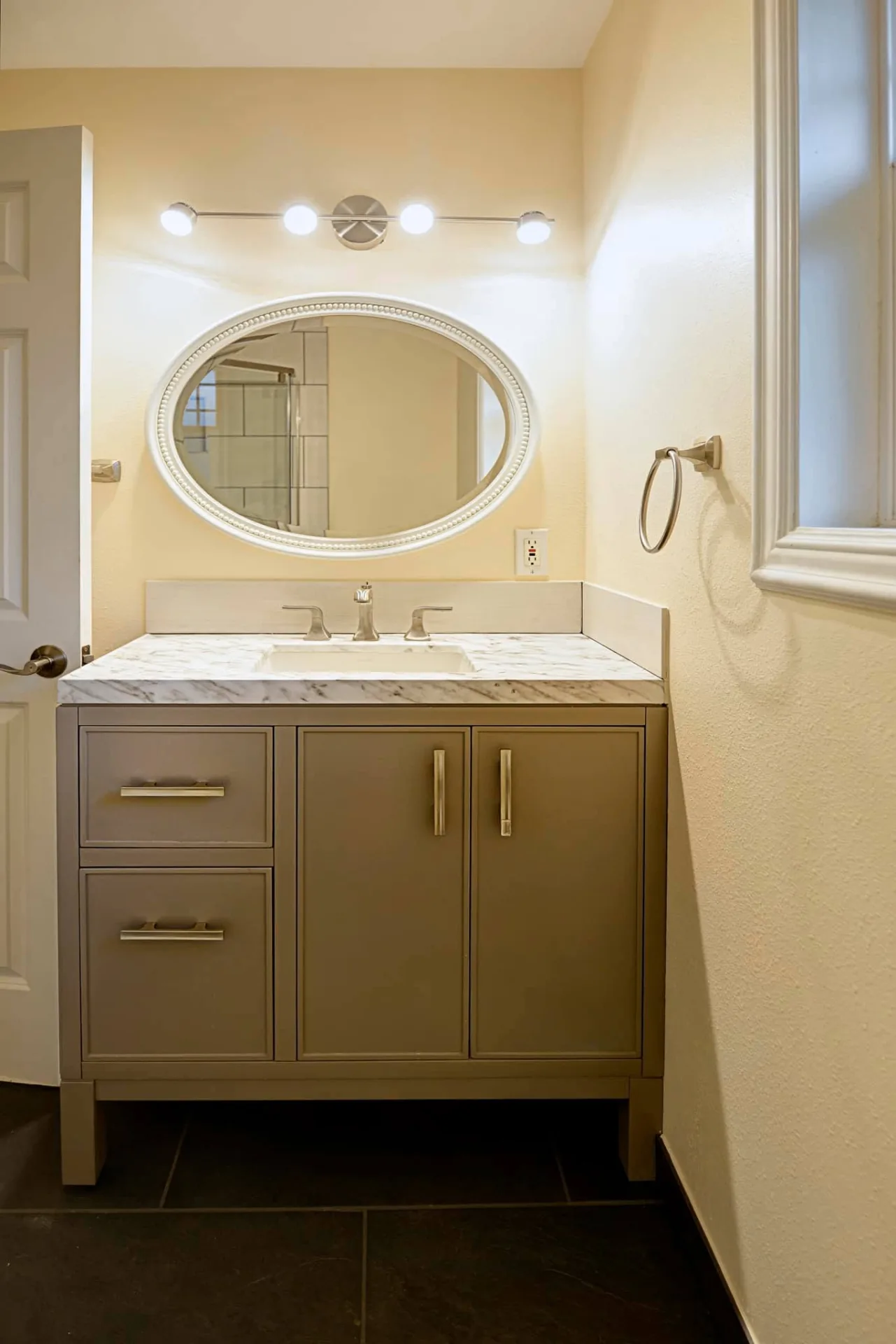 Marble & Brushed Nickel — powder room remodel by Century Renovations in King County, WA