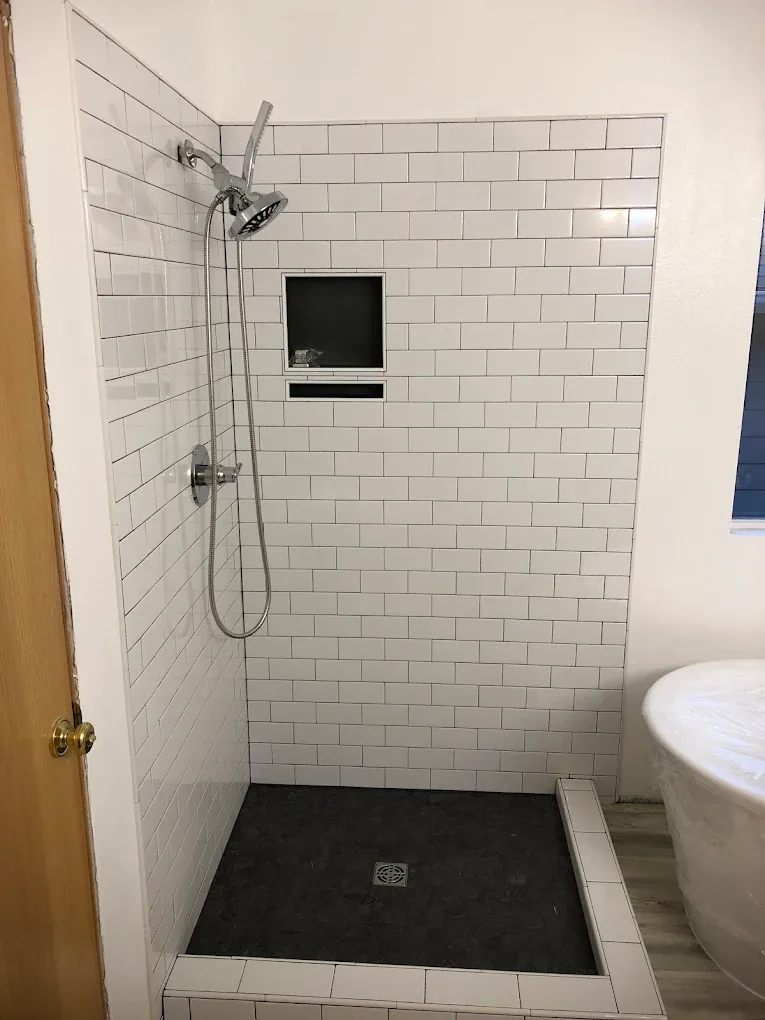 Subway Tile Shower — bathroom remodel by Century Renovations in King County, WA